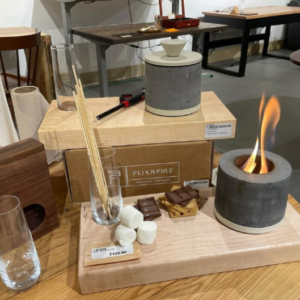 Captivating S'more Board with handcrafted board and mini tabletop fireplace, perfect for delightful indoor or outdoor gatherings.