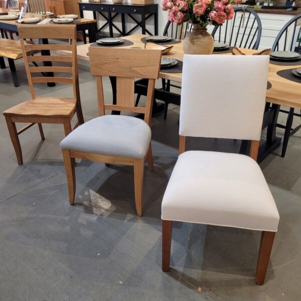 thea dining chair in solid cherry with light grey padded seat