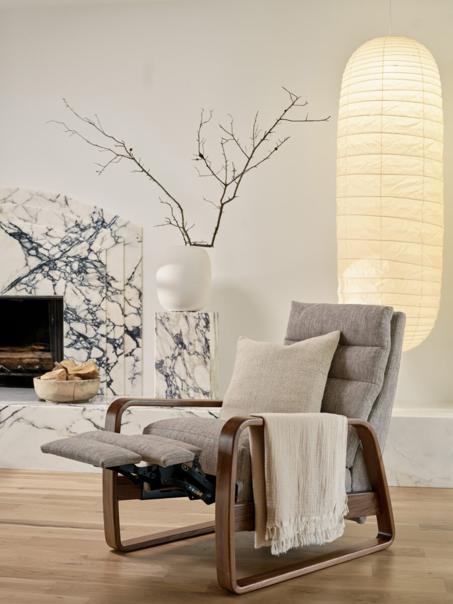 The Elton recliner in a cozy home setting, part of the Reinvented Recliner collection available at Fraser Wood Elements in Fredericksburg, VA.