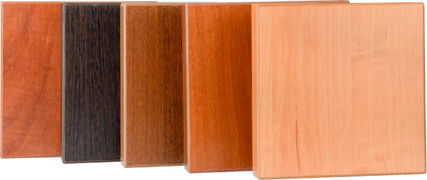 A fanned out selection of wood finish sample swatches showcasing some of the available wood finishes at Fraser Wood Elements in Fredericksburg, VA.