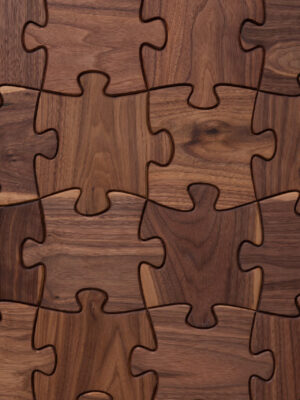 Wooden puzzle piece wall coverings from the Enigma collection by Jamie Beckwith, available at Fraser Wood Elements in Fredericksburg, VA.