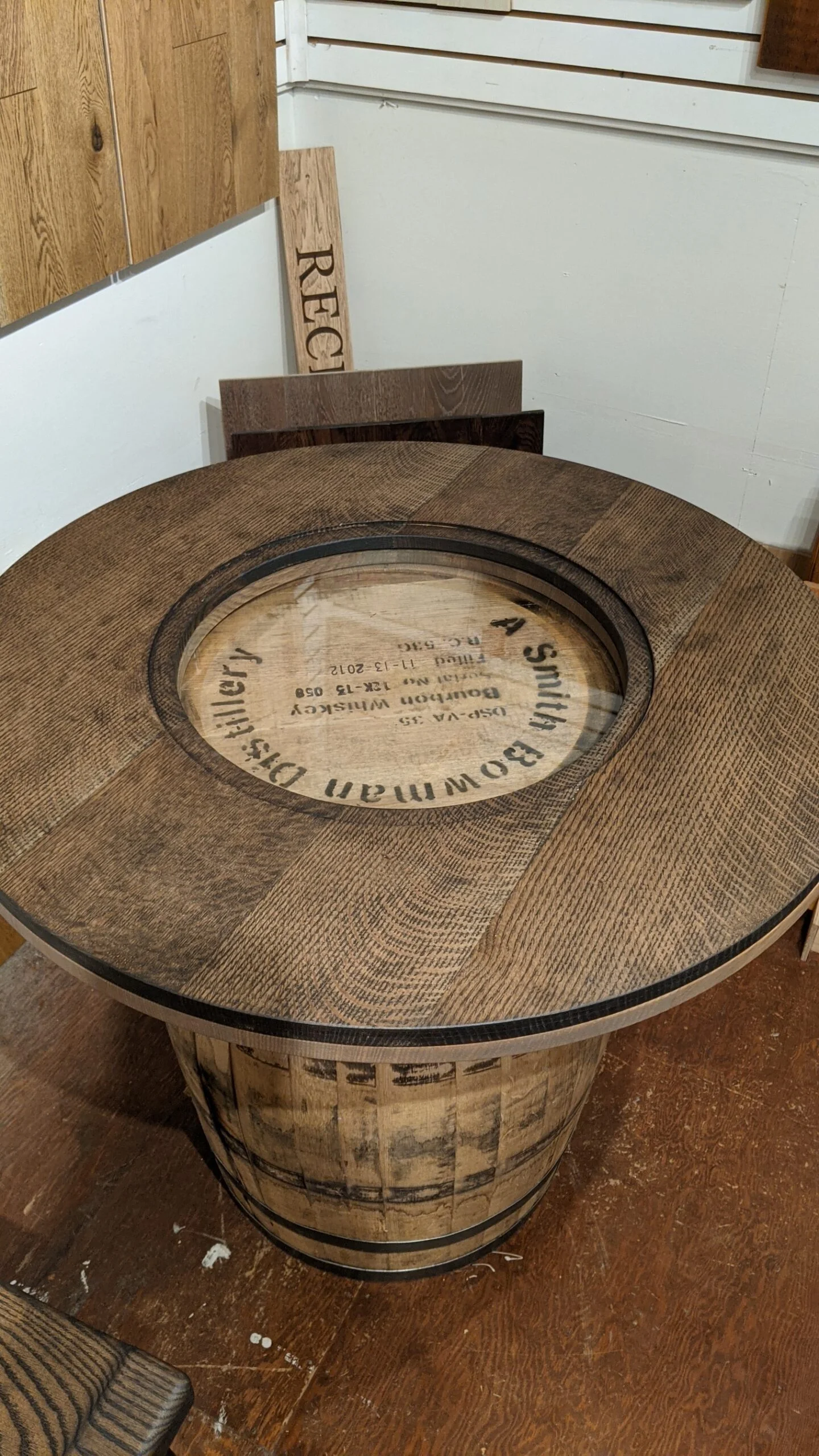 Charcoal-finish whiskey barrel table with A. Smith Bowman barrel markings beneath the glass